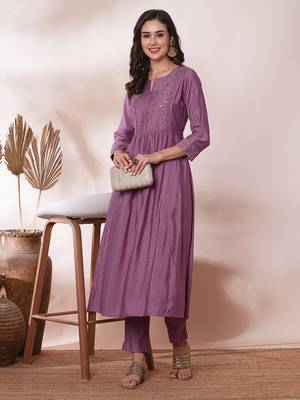 Pocketed a line kurta adorned with zari embroidery and paired with lined silk blend pants. 1