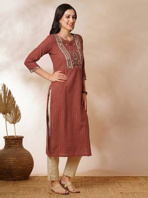 Straight kurta in striped cotton fabric with block printed yoke. 3