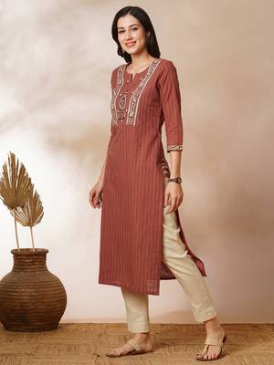 Straight kurta in striped cotton fabric with block printed yoke. 4