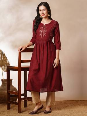 A-line gathered silk blend kurta with zari embroidery and a side pocket. 1