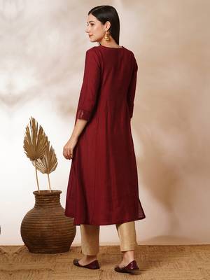 A-line gathered silk blend kurta with zari embroidery and a side pocket. 2
