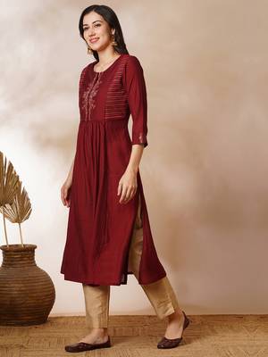 A-line gathered silk blend kurta with zari embroidery and a side pocket. 4