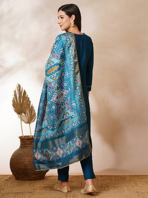 A-line silk blend kurta with zari embroidery detailing paired with printed dupatta and silk blend pants. 2