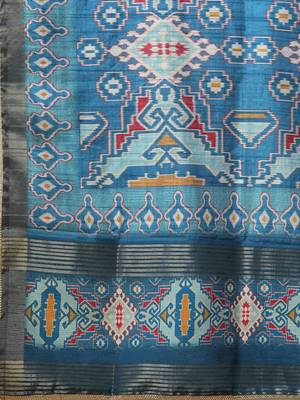 A-line silk blend kurta with zari embroidery detailing paired with printed dupatta and silk blend pants. 4