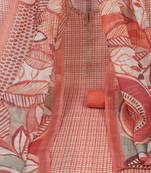 The unstitched suit set with a contemporary floral dupatta and lace detailing around the neck.