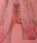 The unstitched dobby chanderi suit set features colorful resham and golden dori embroidery.