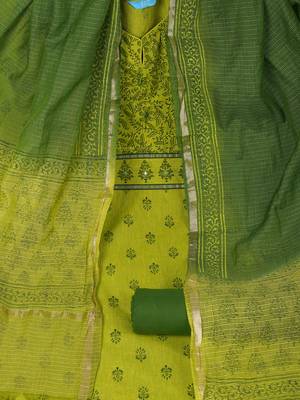Unstitched lime green south cotton suit set with a mix-match block printed yoke. 1