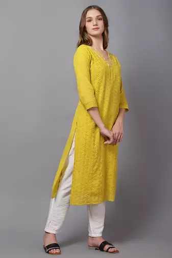 Yellow cambric chikankari kurti with handwork