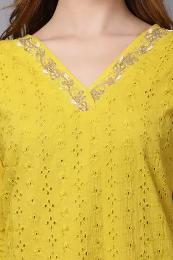 Yellow cambric chikankari kurti with handwork