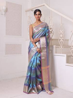 Teal dual-tone tissue saree with zari borders 1