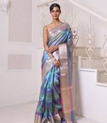 Teal dual-tone tissue saree with zari borders