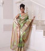 Green dual-tone tissue saree with zari borders