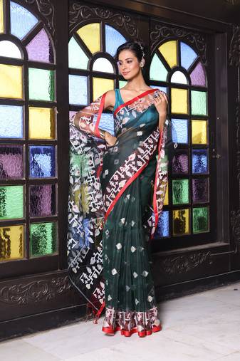 Emerald green muslin saree with jamdani designs