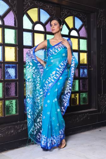 Turquoise muslin saree with jamdani designs