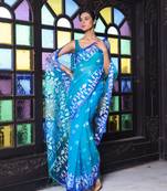 Turquoise muslin saree with jamdani designs