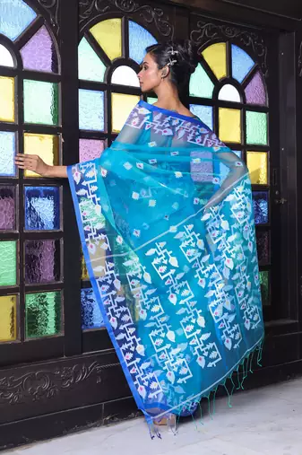 Turquoise muslin saree with jamdani designs