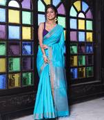 All over zari weaving sea green cotton saree with zari borders