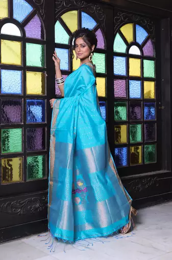 All over zari weaving sea green cotton saree with zari borders