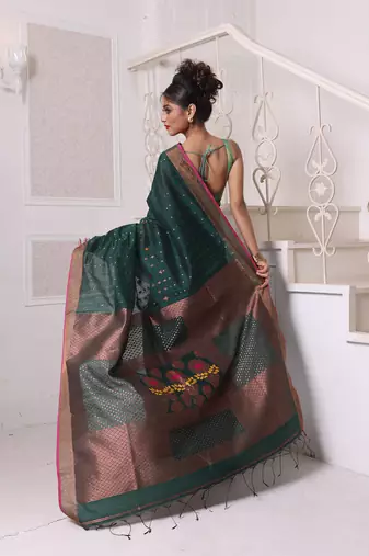 All over zari weaving forest green cotton saree with zari borders