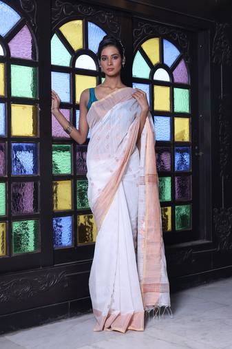 Off white cotton saree with zari borders