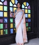 Off white cotton saree with zari borders