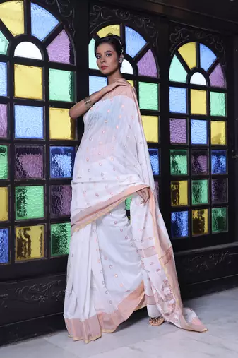 Off white cotton saree with zari borders