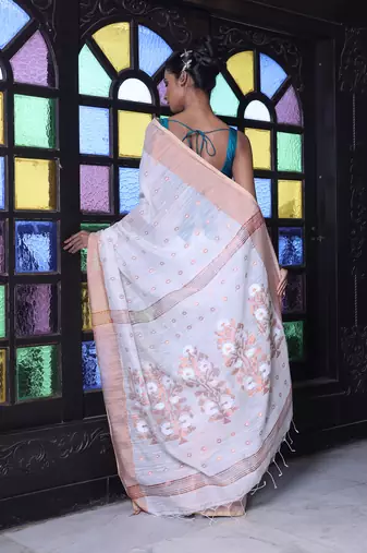 Off white cotton saree with zari borders