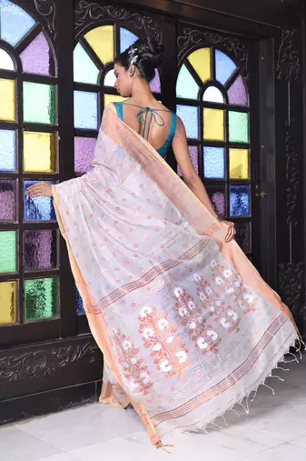 Beige cotton saree with zari borders