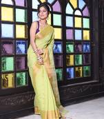 Light green cotton saree with zari borders