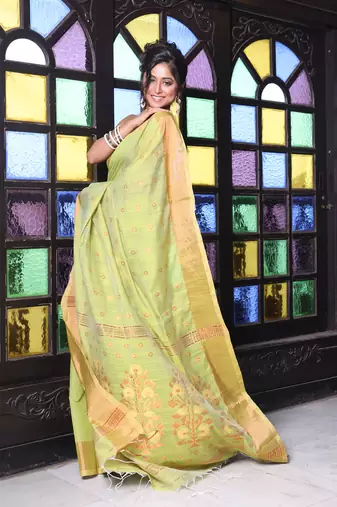 Light green cotton saree with zari borders