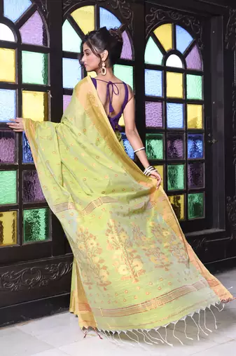 Light green cotton saree with zari borders