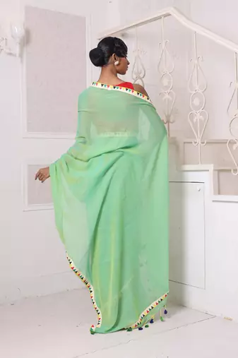 Light green mulmul cotton soft saree with patch work borders