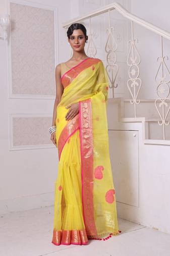 Yellow muslin saree with zari woven nakshi borders