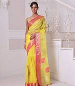 Yellow muslin saree with zari woven nakshi borders