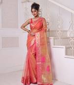 Orange muslin saree with zari woven nakshi borders