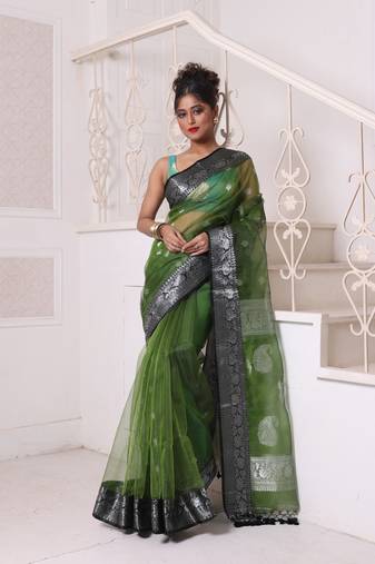 Green muslin saree with zari woven nakshi borders