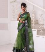 Green muslin saree with zari woven nakshi borders