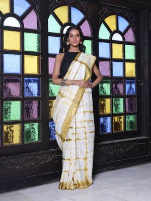 All over foliage embroidery white and mustard silk saree with chanderi borders 1