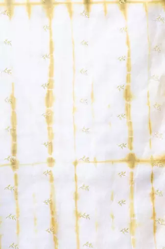 All over foliage embroidery white and mustard silk saree with chanderi borders