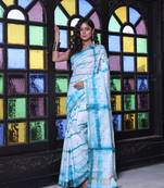All over foliage embroidery white and sky blue silk saree with chanderi borders
