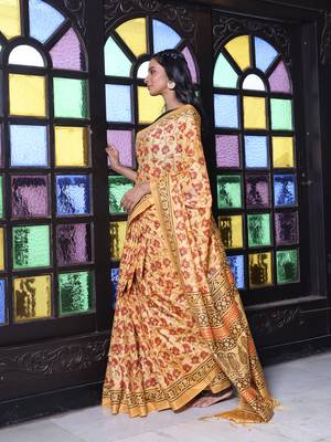Yellow printed silk soft saree with printed borders 2