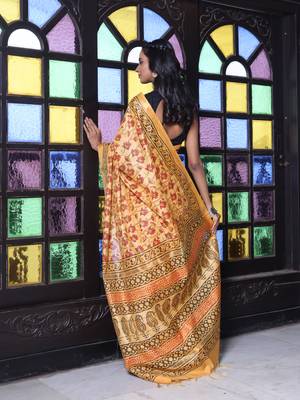 Yellow printed silk soft saree with printed borders 3