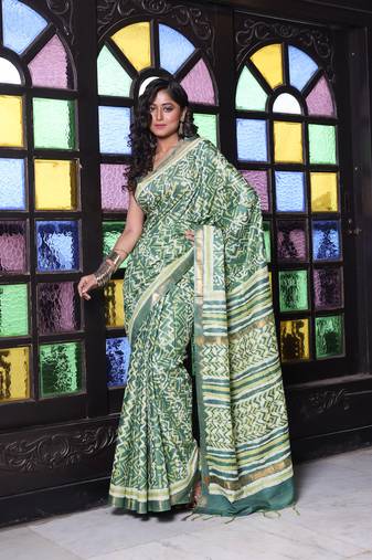 Green printed silk soft saree with printed borders