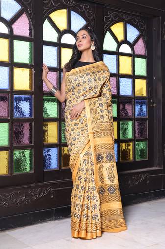 Yellow printed silk soft saree with printed borders