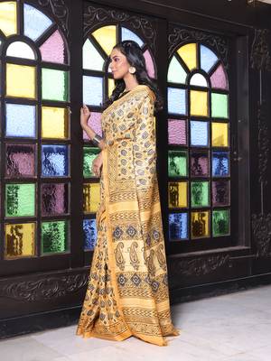 Yellow printed silk soft saree with printed borders 2