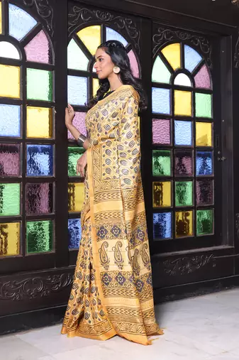 Yellow printed silk soft saree with printed borders