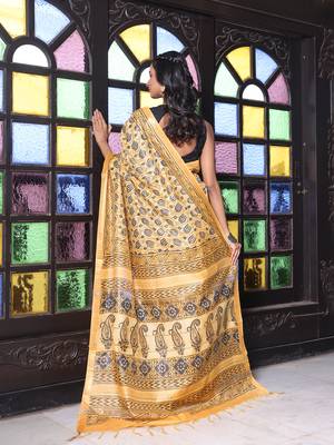 Yellow printed silk soft saree with printed borders 3