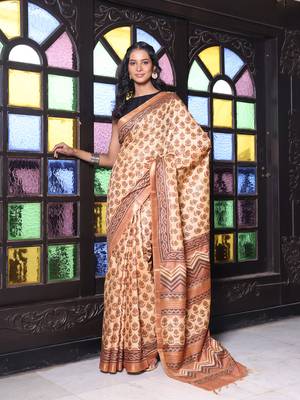 Beige printed silk soft saree with printed borders 1