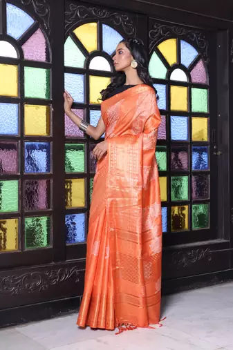 Orange silk soft saree with zari borders