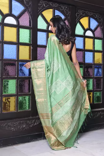 Sap green silk soft saree with zari borders